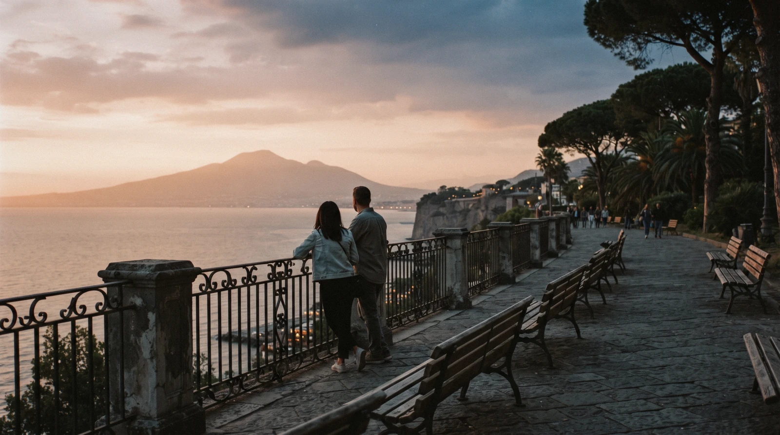 Villa Comunale terrace in Sorrento with benches, bougainvillea and the Gulf of Naples with Vesuvius beyond